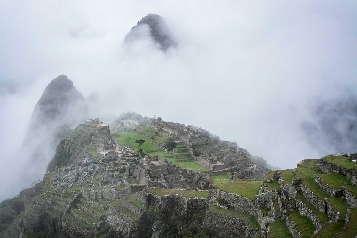 Mountain ruins surrounded by cloud